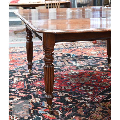 49 - # An early Victorian mahogany draw leaf dining table, the moulded edge top with rounded corners over... 