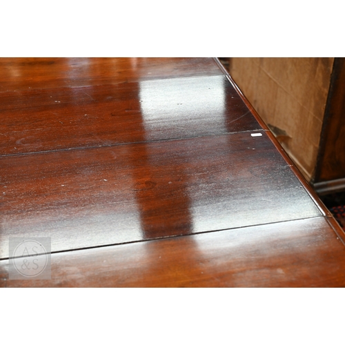 49 - # An early Victorian mahogany draw leaf dining table, the moulded edge top with rounded corners over... 