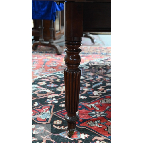 49 - # An early Victorian mahogany draw leaf dining table, the moulded edge top with rounded corners over... 