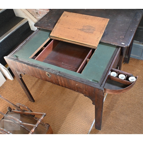 14 - A Georgian mahogany Chippendale period architect's table, on roller castors, heavily distressed over... 