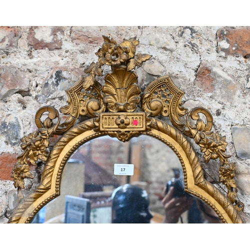 17 - An antique giltwood and gesso girandole mirror in the rococo style, of trefoil form surmounted by a ... 
