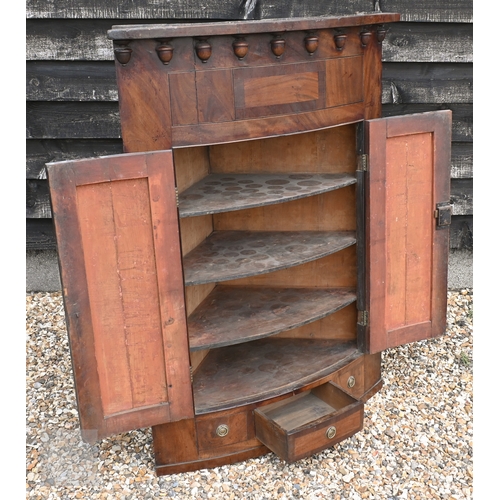 173 - A large George III mahogany wall-hanging barrel-front corner cupboard, 92 x 128 cm high
