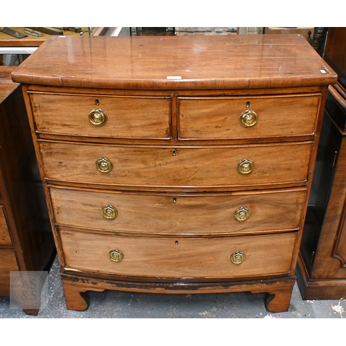19 - A Victorian mahogany bow-front chest of two short over three longs graduated drawers, with brass fit... 