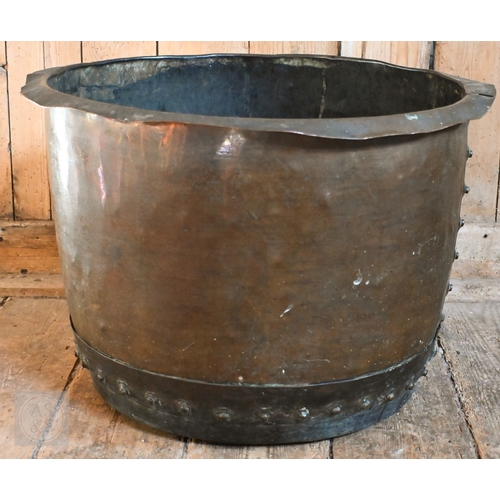 2 - An antique weathered rivetted wash copper log-bin/planter, 57 cm dia. c 40 cm h
