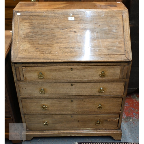 20 - # A compact mahogany bureau, with basic fitted interior over four long graduated drawers, raised on ... 