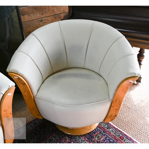 28 - A pair of Art Deco cream leather and burr maple tub armchairs (2) (leather stained)