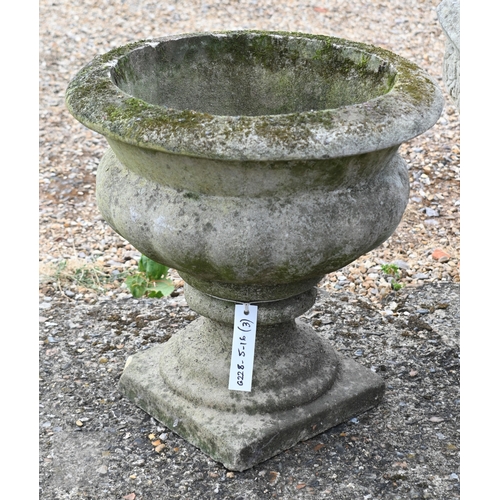 30 - Three various weathered cast stone planters in the classical style (3)