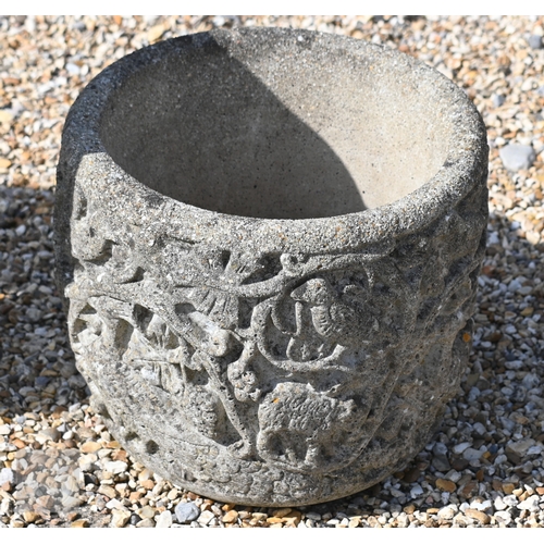 33 - A weathered cast stone two piece shell form birdbath to/with a circular reconstituted stone planter ... 