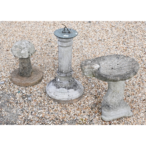 33 - A weathered cast stone two piece shell form birdbath to/with a circular reconstituted stone planter ... 