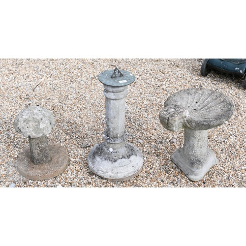 33 - A weathered cast stone two piece shell form birdbath to/with a circular reconstituted stone planter ... 