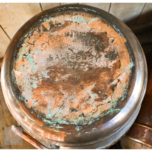 35 - Two antique copper milk churns and covers, one branded for United Dairies, the other for Percy Churc... 