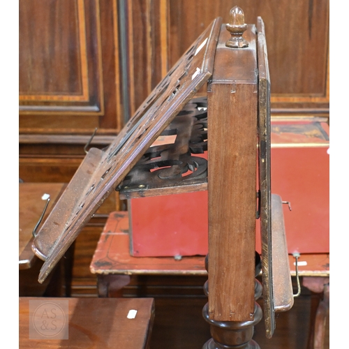 39 - A Regency mahogany double sided tripod music stand, the adjustable easels with fret cut lyre panel r... 