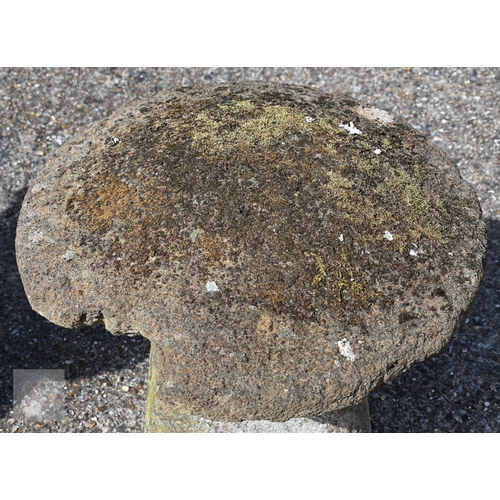 4 - Two large antique square tapering cut staddle stones with circular caps, weathered and usual superfi... 