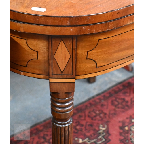 40 - A Victorian inlaid mahogany fold-over double gateleg tea table, raised on gadrooned turned supports