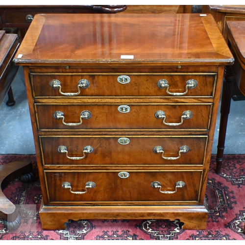 45 - A Georgian style mahogany Batchelors chest of four long graduated drawers, with brass fittings, rais... 