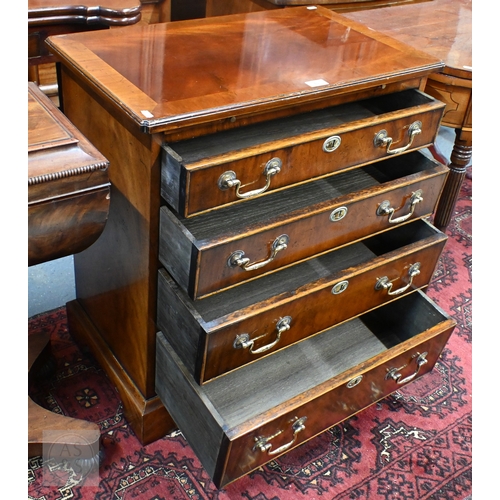 45 - A Georgian style mahogany Batchelors chest of four long graduated drawers, with brass fittings, rais... 