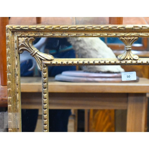 50 - A vintage Chippendale style gilt cushion framed mirror, 64 cm x 98 cm