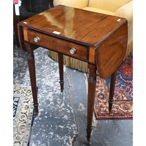 53 - A small Victorian mahogany drop leaf occasional table, with frieze drawer and raised on turned suppo... 