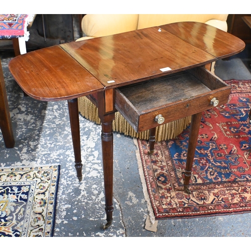 53 - A small Victorian mahogany drop leaf occasional table, with frieze drawer and raised on turned suppo... 