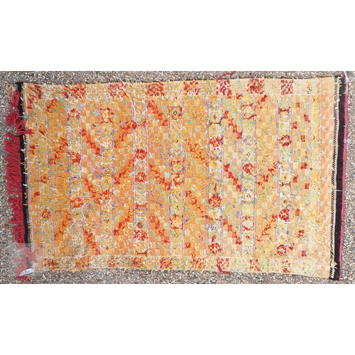 56 - A vintage handloomed Portuguese 'Turkish Soumak' design rug, in soft multi-colours, 180 cm x 106 cm