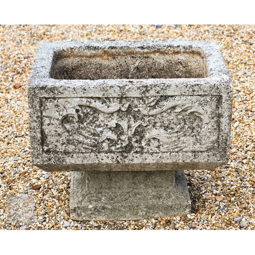 6 - A weathered rectangular relief cast stone trough planter, raised on a square pillar and plinth, cm x... 