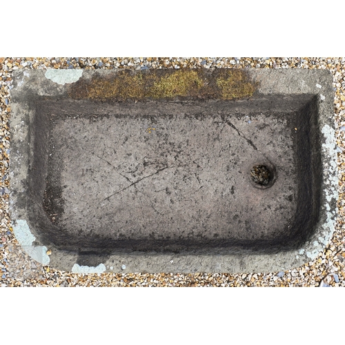 8 - An antique weathered rectangular cut stone sink 81 cm x 51 cm x 20 cm h