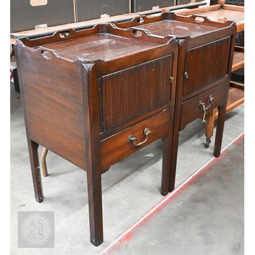 174 - A pair of George III style mahogany tray top step commodes, with opposing tambour doors over green s...