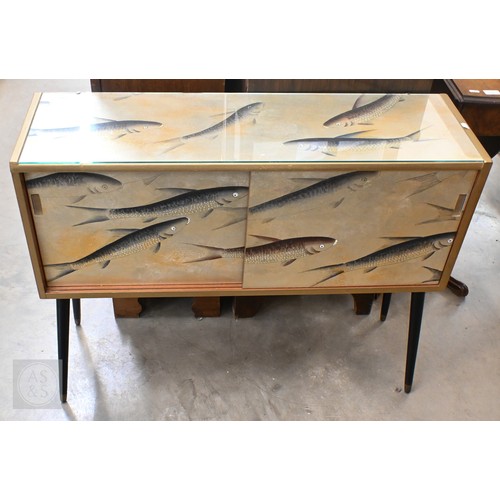 143 - A small Mid-Century modern teak sideboard with sliding doors and black splayed legs, up-cycled with ... 