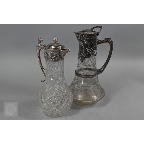 1 - A heavy quality cut glass claret jug with embossed and chased silver collar, cover and handle, C J V... 