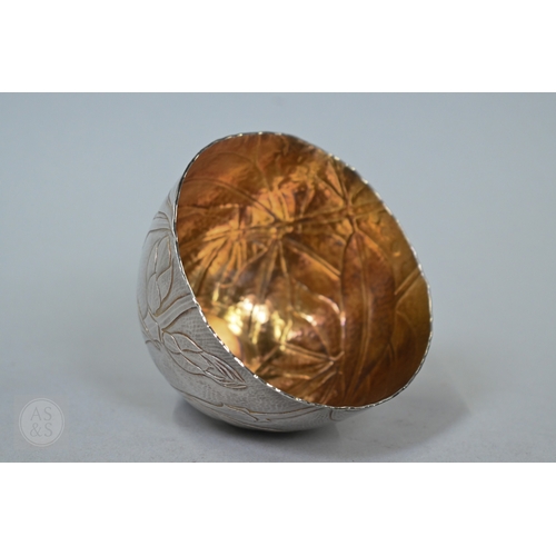 Michael Lloyd (b.1950 Salisbury), a silver 'Elder Twig' bowl with foliate-chased decoration and gilt interior, Edinburgh 1997, 4.2oz (130g), 9.5cm diameter; lot includes 1997 Scottish Gallery (Aitken Dott Ltd) exhibition catalogue;