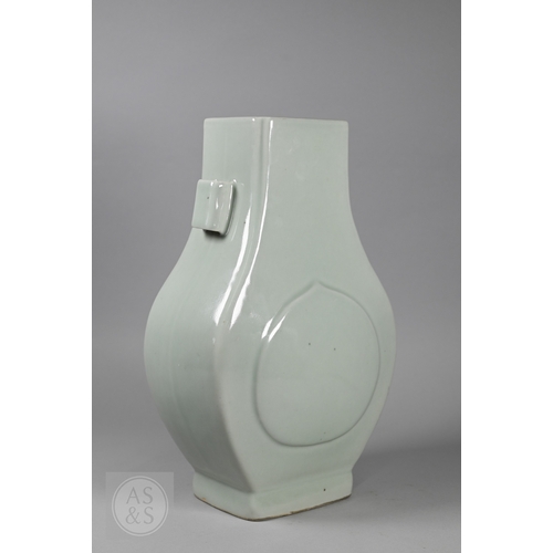336 - A Chinese celadon porcelain 'arrow' vase, (fanghu) six-character Yongzheng mark in underglaze blue b... 