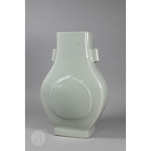 336 - A Chinese celadon porcelain 'arrow' vase, (fanghu) six-character Yongzheng mark in underglaze blue b... 