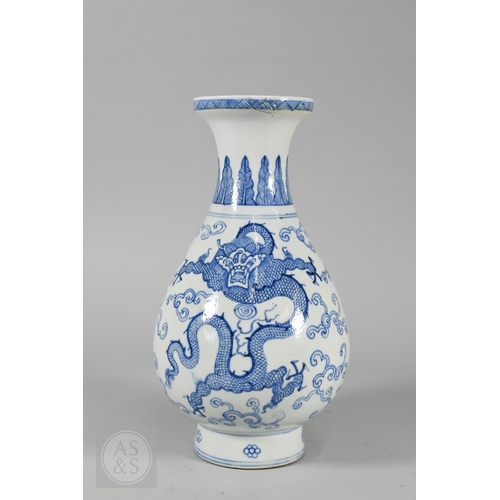 338 - A 19th century Chinese blue and white pear-shaped vase, late Qing period, painted in underglaze blue... 