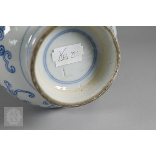 338 - A 19th century Chinese blue and white pear-shaped vase, late Qing period, painted in underglaze blue... 