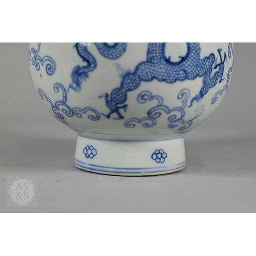 338 - A 19th century Chinese blue and white pear-shaped vase, late Qing period, painted in underglaze blue... 