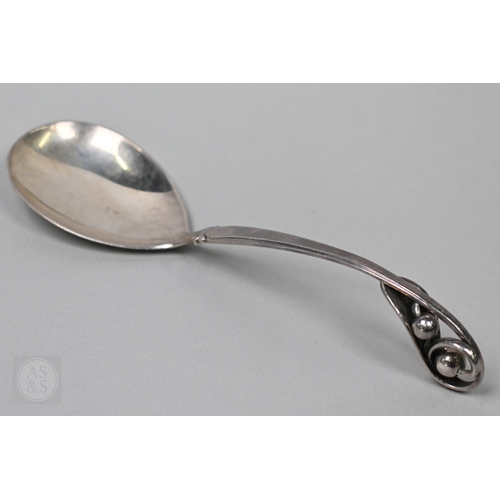 69 - A Danish Sterling serving spoon with stylised leaf and berry finial, stamped W&S Sorensen, to/w ... 