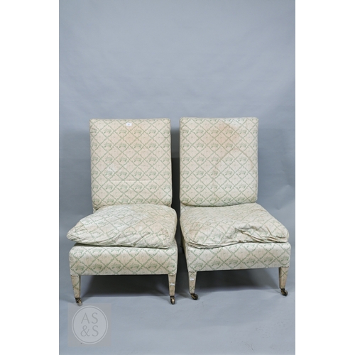 612 - A rare pair of generous high back open salon chairs by Portman Upholstery, London W1, upholstered in... 