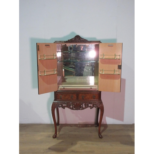 138 - A reproduction walnut Cocktail Cabinet 5ft 2in H x 2ft 7in W