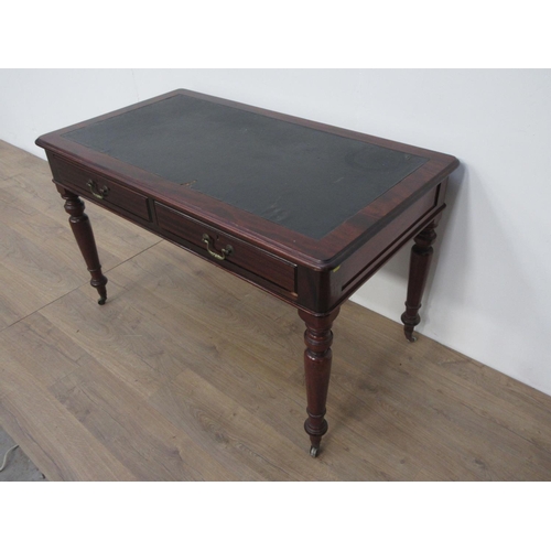 144 - A Victorian mahogany Writing Table fitted two drawers on turned supports and casters 4ft W x 2ft 5in... 