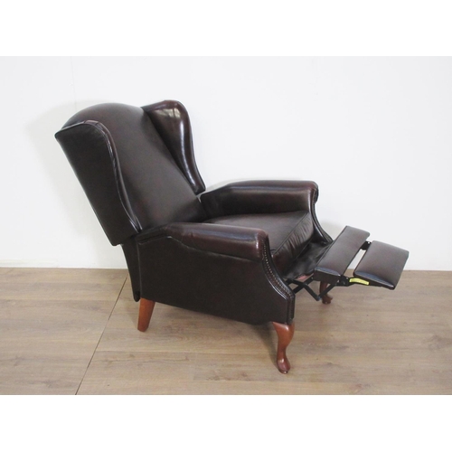 204 - A leather office/library Armchair with cabriole front supports.