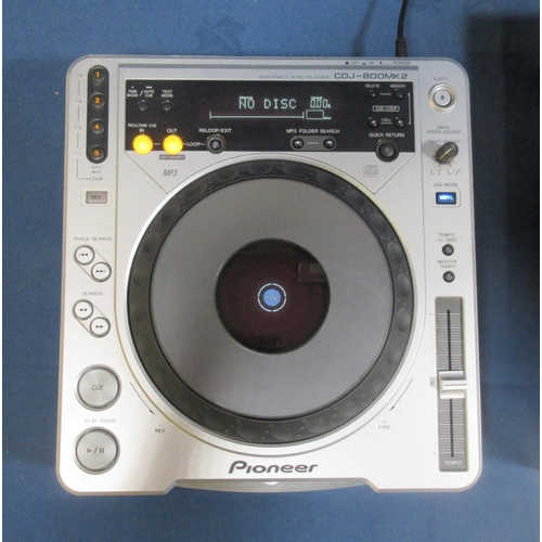 213 - A Pair of Pioneer CDJ-800 MK2 CD/MP3 Decks, a Behringer DJX700 four channel professional Mixer and a... 