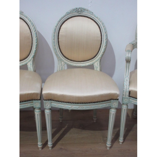 221 - A set of six French cream painted Salon Chairs with leafage carving and cream upholstery, mounted up... 