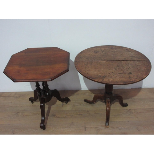 238 - A Victorian mahogany octagonal Occasional Table mounted upon three turned columns and tripod support... 