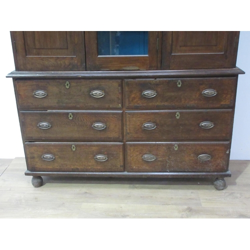 24 - A 19th Century oak enclosed Dresser with six drawers beneath 6ft 8in H x 5ft W