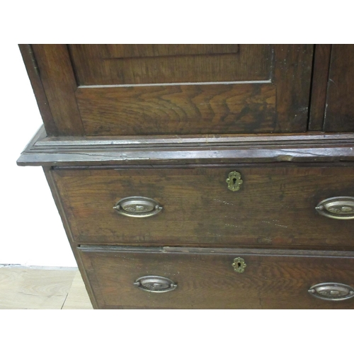 24 - A 19th Century oak enclosed Dresser with six drawers beneath 6ft 8in H x 5ft W