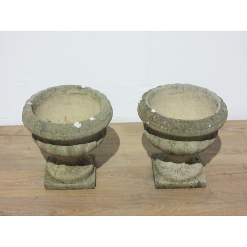 243 - A pair of composite stone Planters on plinths 1ft 3in D