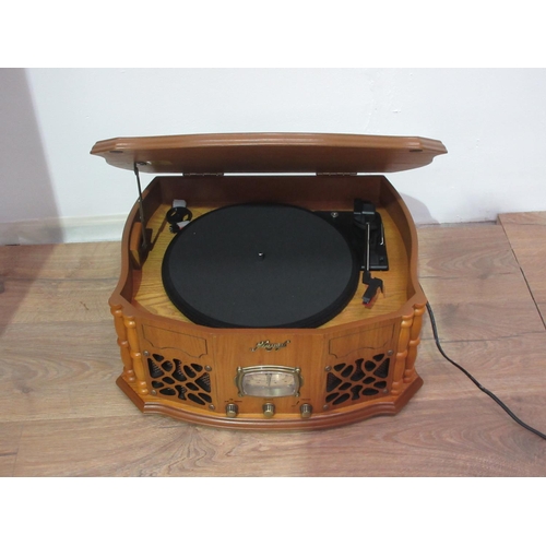 246 - A modern stereo Phonograph and a mahogany two door record Cabinet containing a quantity of records 1... 