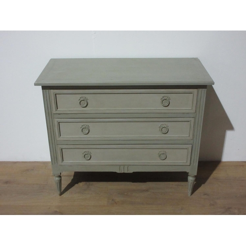 268 - A French green painted Chest of three drawers mounted upon tapering supports.