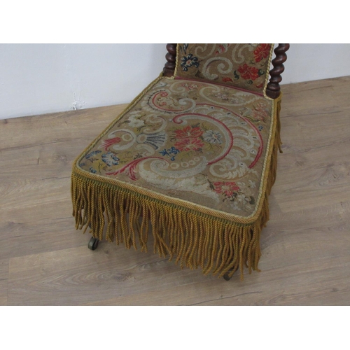 276 - A Victorian walnut framed Prayer Chair with barleytwist uprights and floral gold needlework tapestry... 