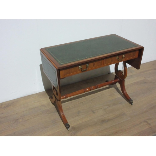 287 - A reproduction yewwood veneered Sofa Table with leather inset writing surface fitted two frieze draw... 